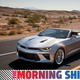 A photo of a Chevrolet Camaro convertible with The Morning Shift graphic on the bottom.